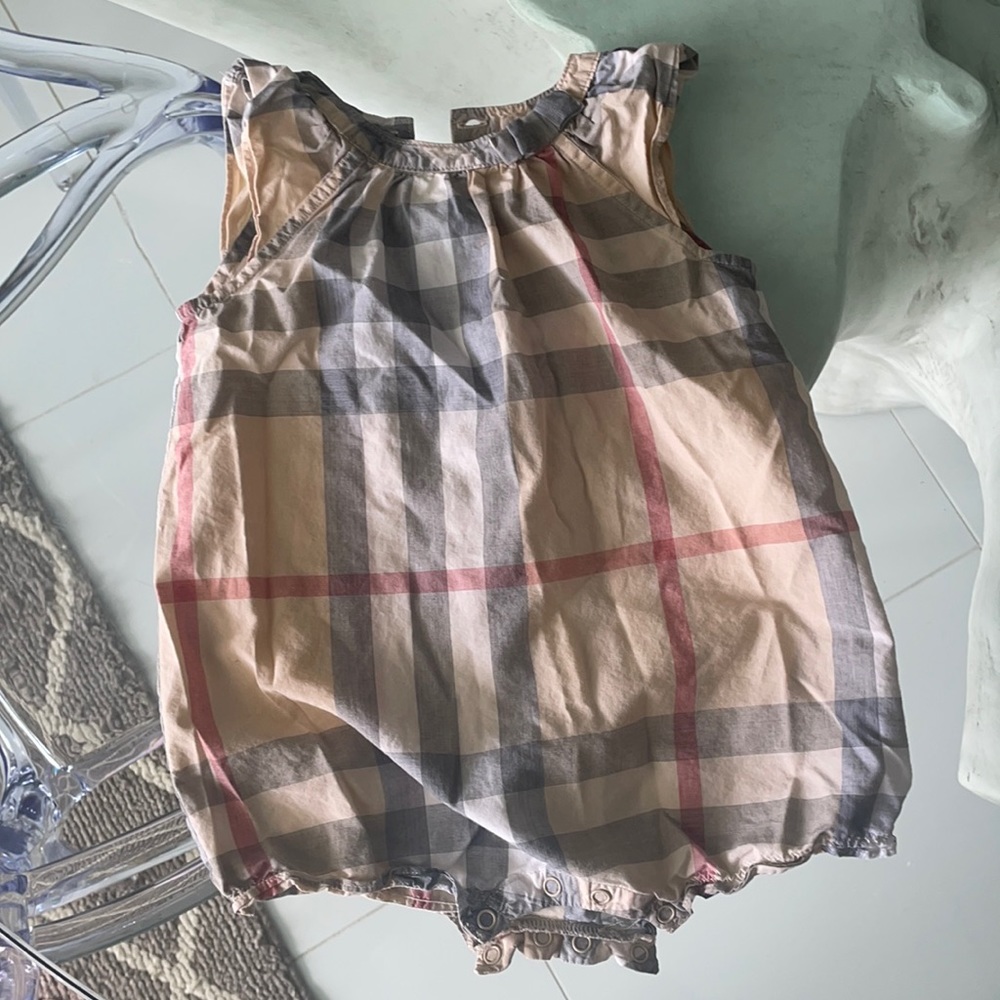 Burberry one piece , gently used in excellent condition !!